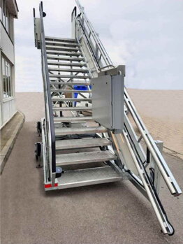 GTLE platform on staiirs to the aircraft
